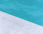 empty gray floor beside pool
